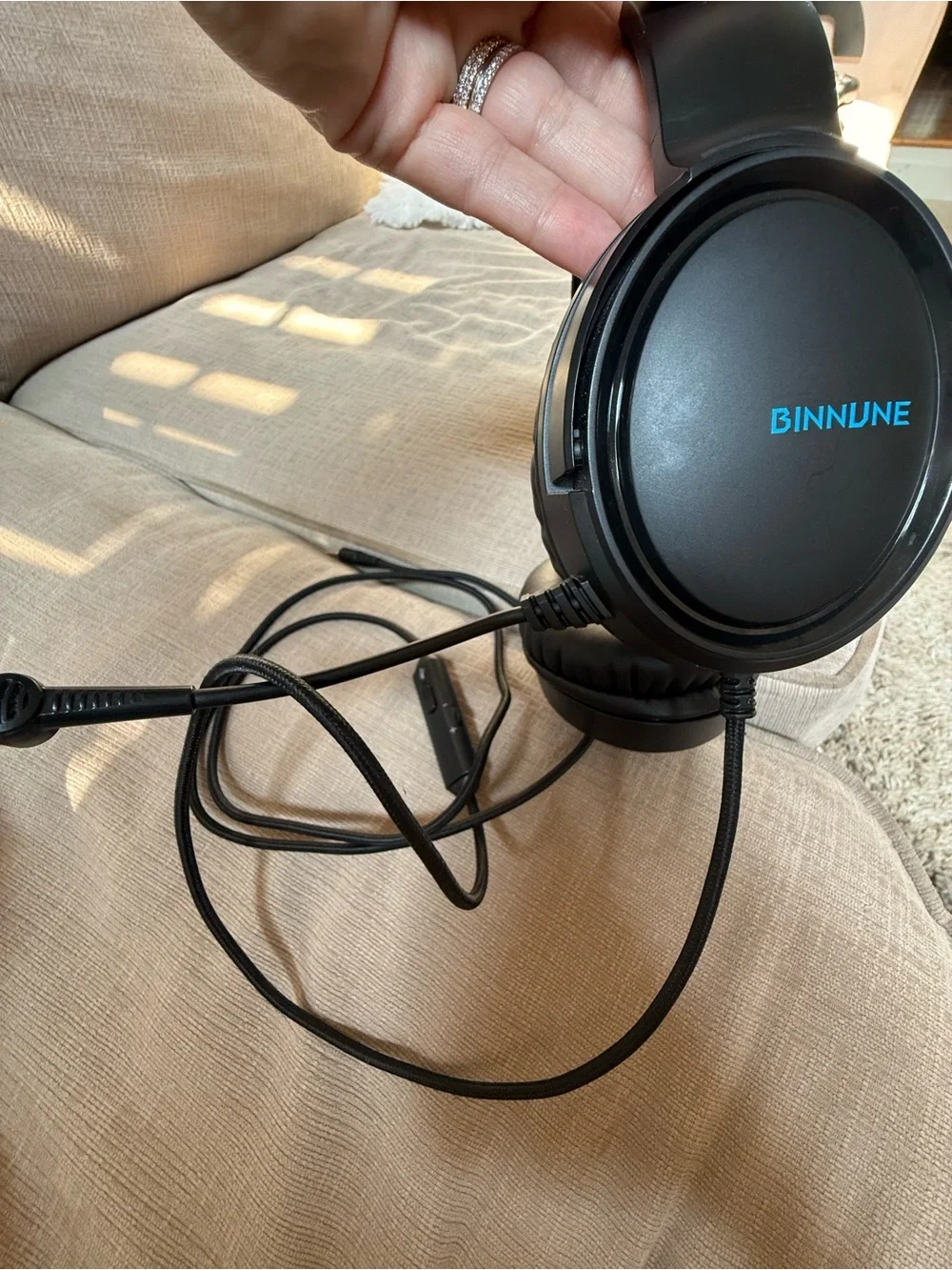 Black Over-Ear Gaming Headset with Blue Headband Accent